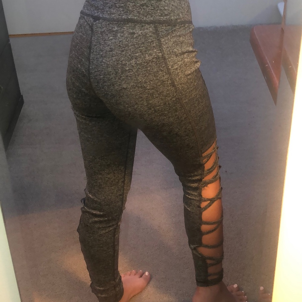 grey leggings with cross pattern on legs
